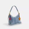 Laurel skuldertaske i Loved Denim med vedhæng