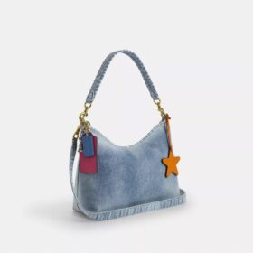 Laurel skuldertaske i Loved Denim med vedhæng