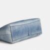 Laurel skuldertaske i Loved Denim med vedhæng