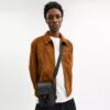 League-telefon-crossbody-taske i Signature Canvas