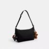 Leo Crossbody i Signature Nylon med vedhæng
