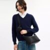 Lille Finn-crossbody-taske med punge