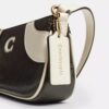 Lille skuldertaske i bowling-stil