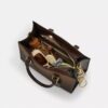 Maggie lille tote-tasker i Ombre Signature Canvas
