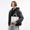 Maggie lille tote-tasker i Signature Canvas