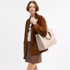 Maggie-tote-taske i Signature Canvas med blokmønster