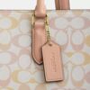 Maggie-tote-tasker i Signature Canvas