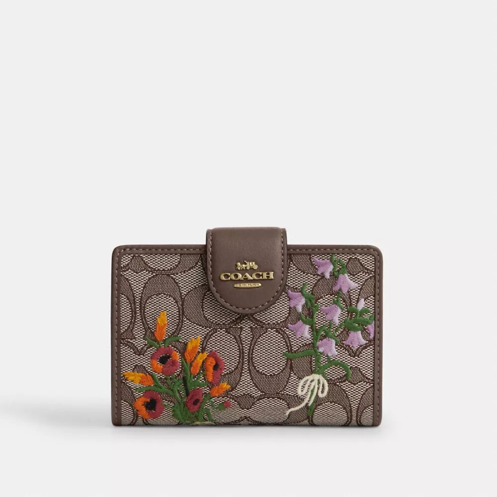 Mellemstor hjørnepung med lynlås i signatur-jacquard med blomsterbroderi