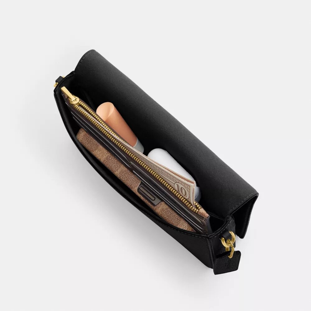 Mila crossbody-taske med Signature Canvas