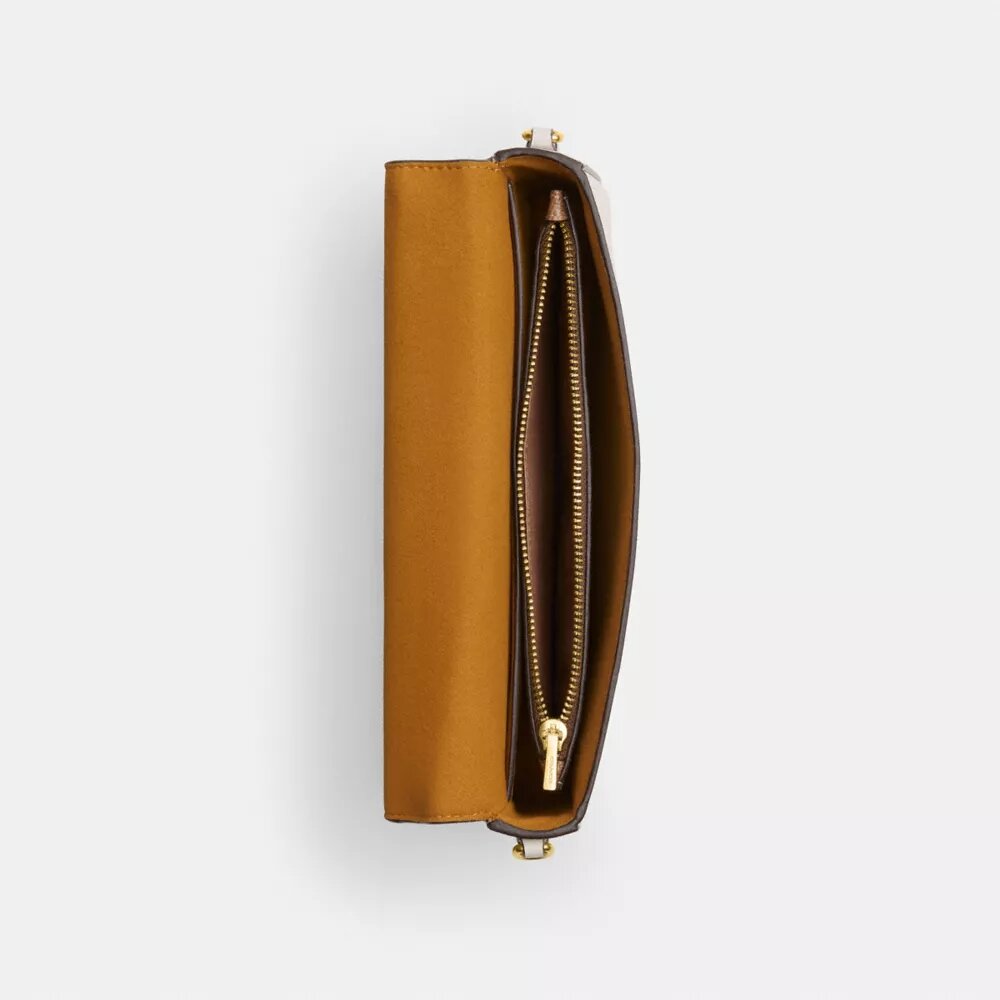 Mila crossbody-taske med Signature Canvas