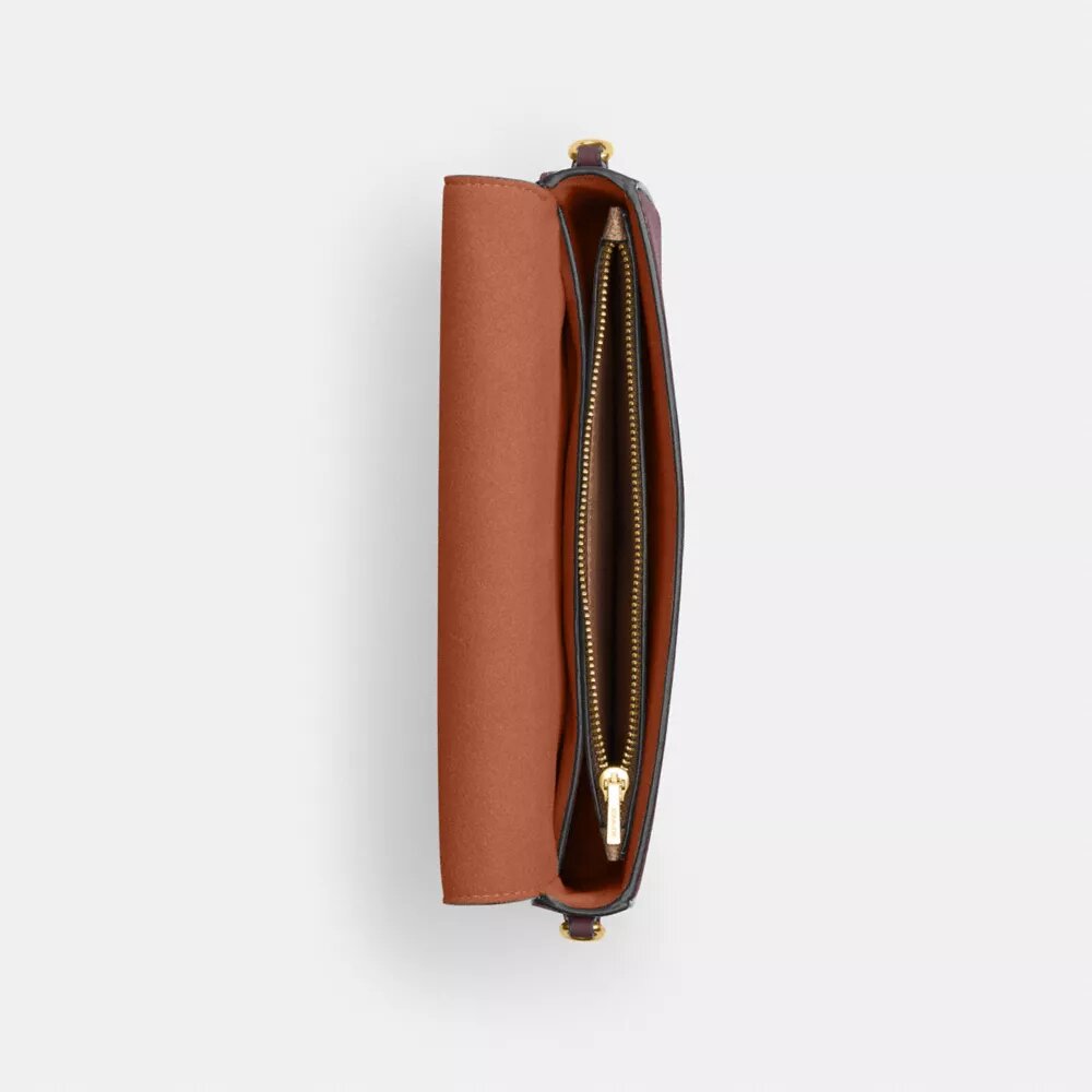 Mila crossbody-taske med Signature Canvas