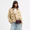 Mila crossbody-taske med Signature Canvas