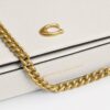 Mila crossbody-taske med Signature Canvas