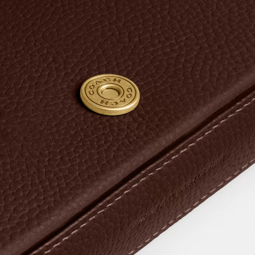 Mila crossbody-taske med Signature Canvas