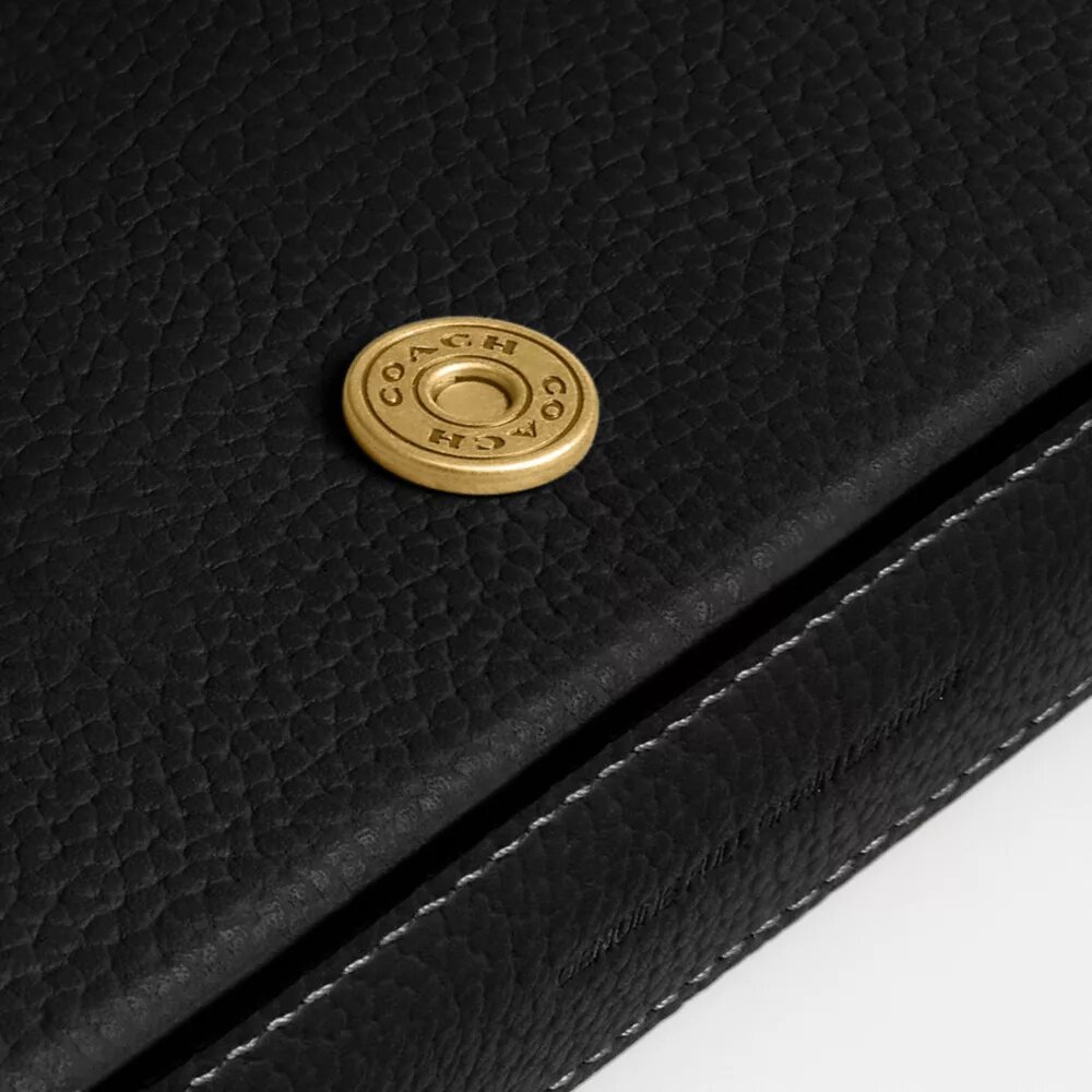 Mila crossbody-taske med Signature Canvas