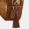 Mini Carey-crossbody-taske i hårkalv med ko-print