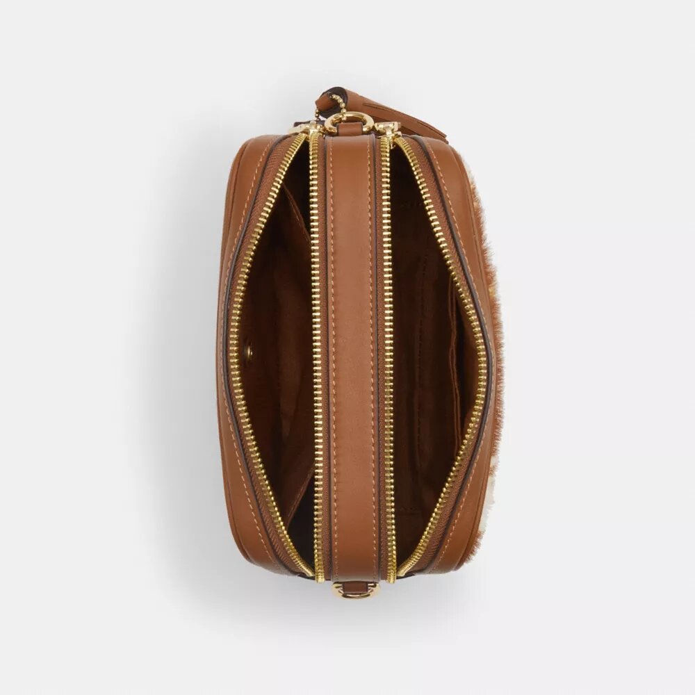 Mini Carey-crossbody-taske i hårkalv med ko-print