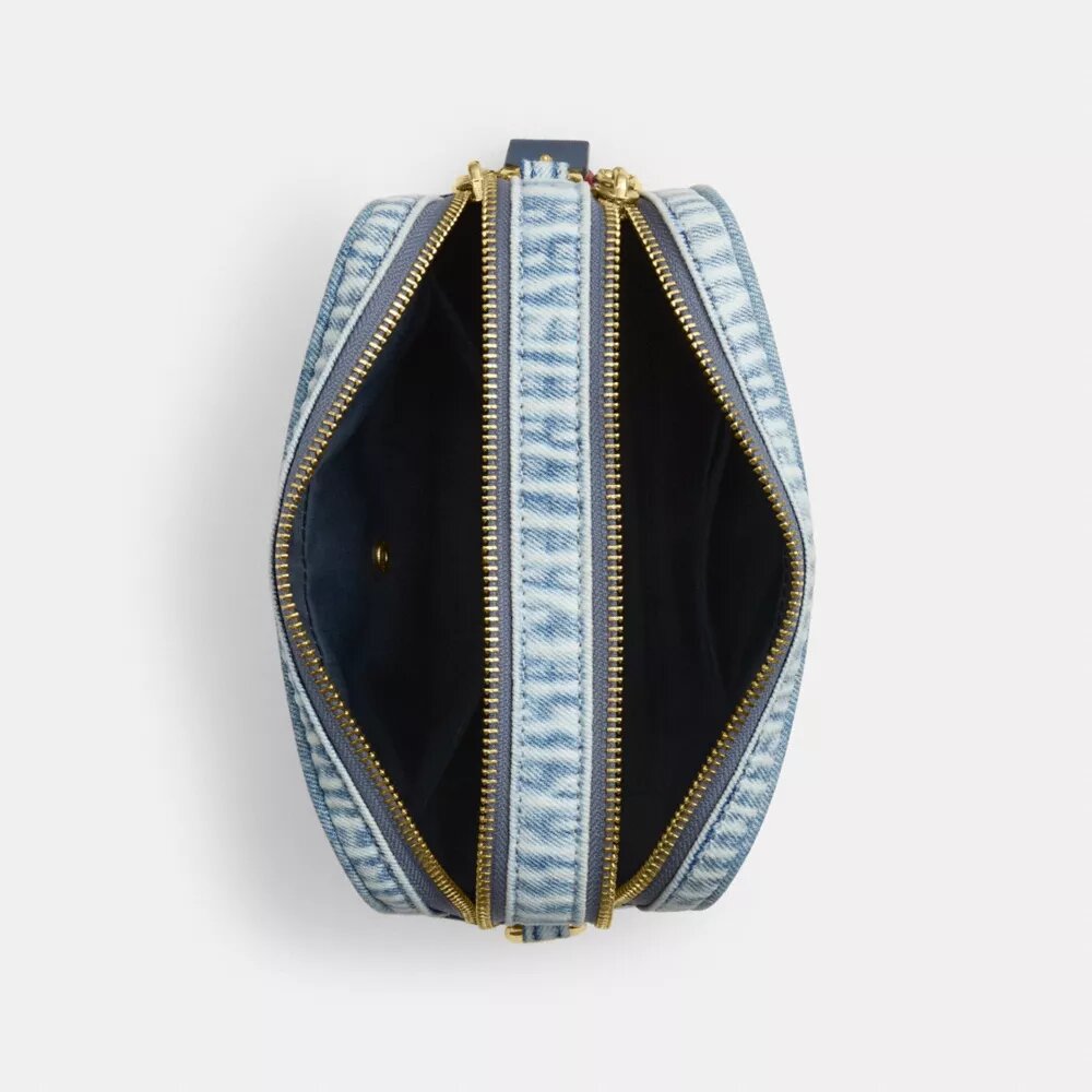 Mini Carey-crossbody-taske i Loved Denim med Vedhæng