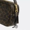 Mini Carey crossbody-taske i Loved Signature Canvas
