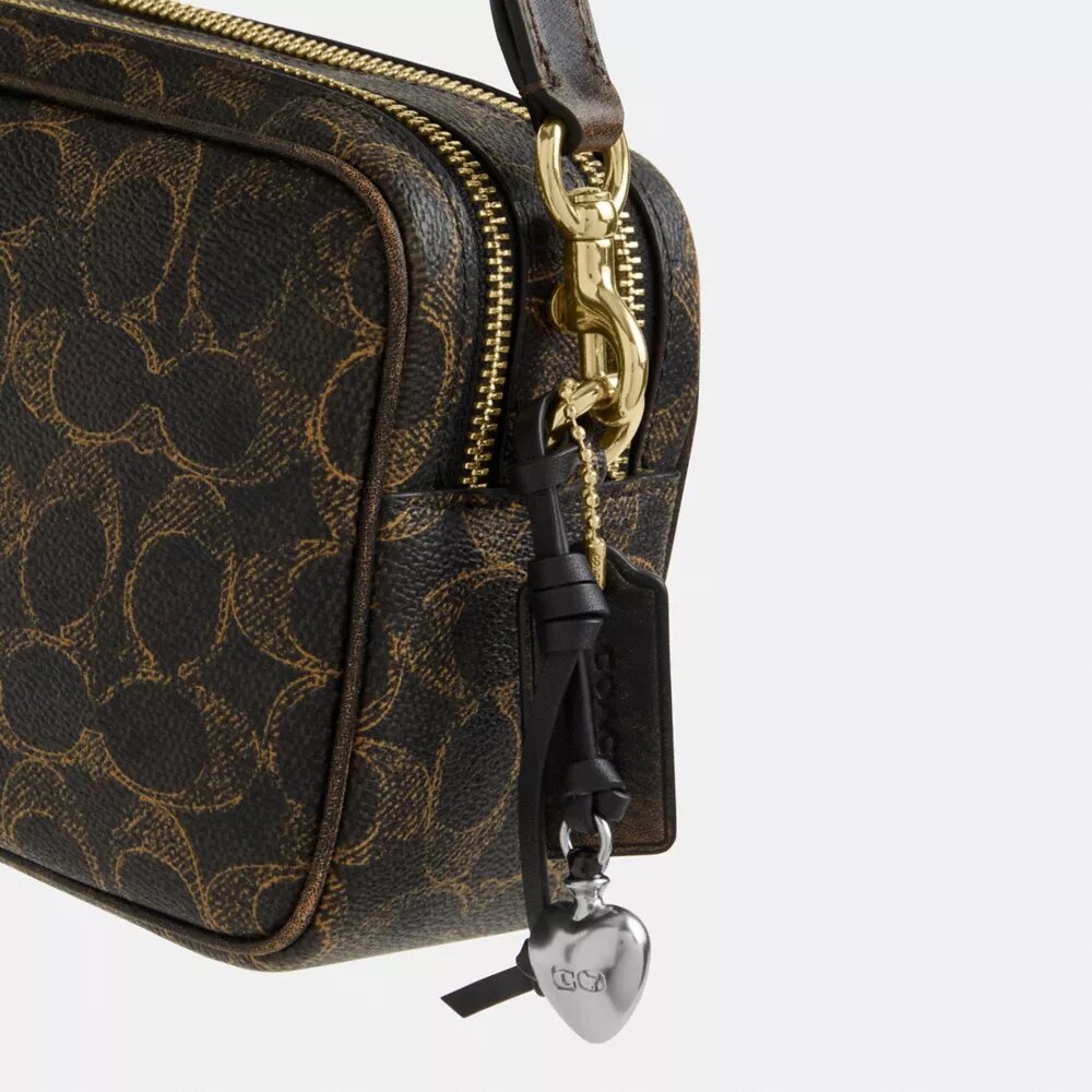 Mini Carey crossbody-taske i Loved Signature Canvas