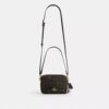 Mini Carey crossbody-taske i Loved Signature Canvas