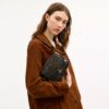 Mini Carey crossbody-taske i Loved Signature Canvas