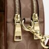 Mini Carey-crossbody-taske i Signature Canvas