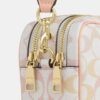 Mini Carey-crossbody-taske i Signature Canvas