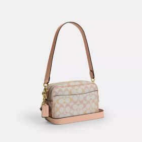 Mini Carey-crossbody-taske i Signature Canvas