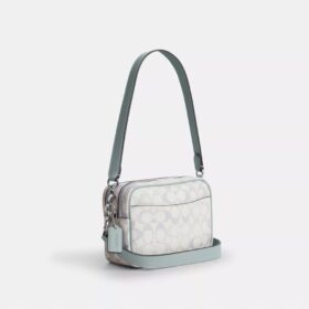 Mini Carey-crossbody-taske i Signature Canvas