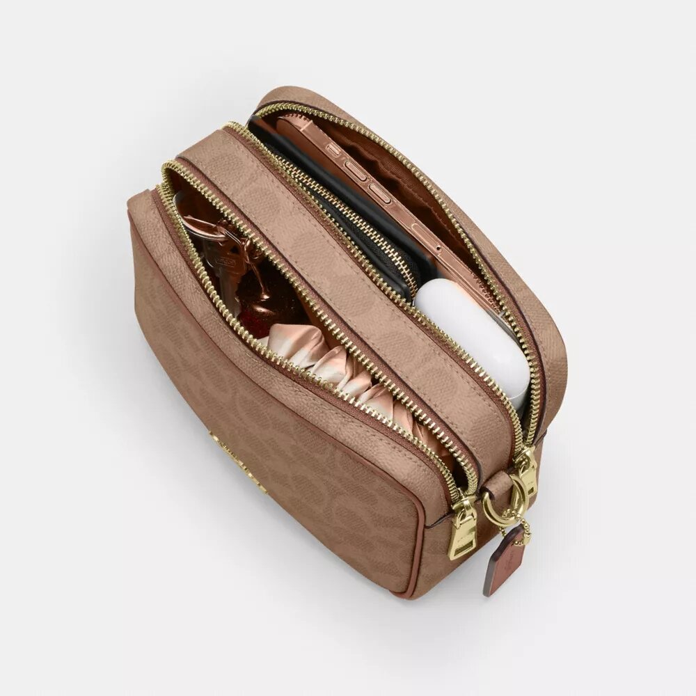 Mini Carey-crossbody-taske i Signature Canvas
