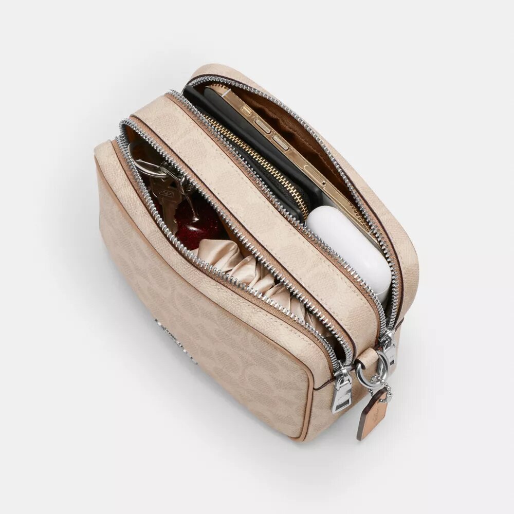 Mini Carey-crossbody-taske i Signature Canvas