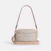 Mini Carey-crossbody-taske i Signature Canvas