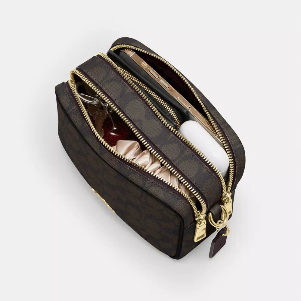 Mini Carey-crossbody-taske i Signature Canvas