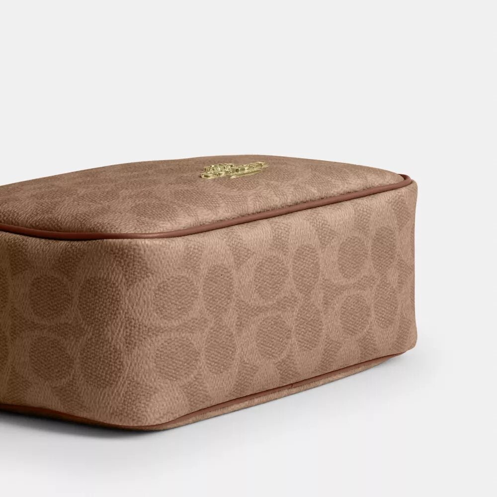 Mini Carey-crossbody-taske i Signature Canvas