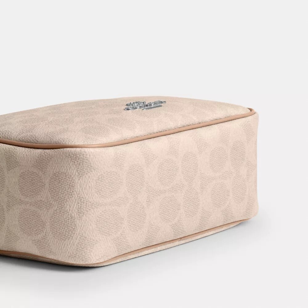 Mini Carey-crossbody-taske i Signature Canvas