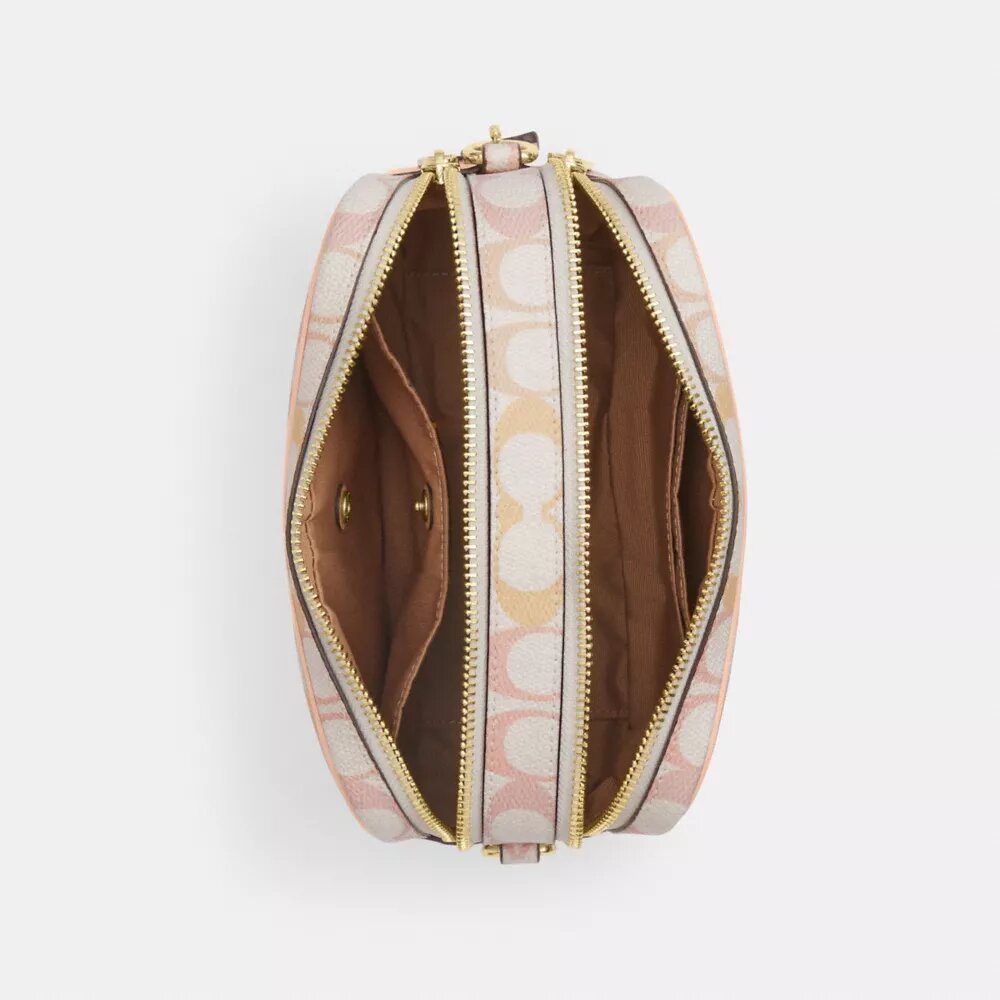 Mini Carey-crossbody-taske i Signature Canvas