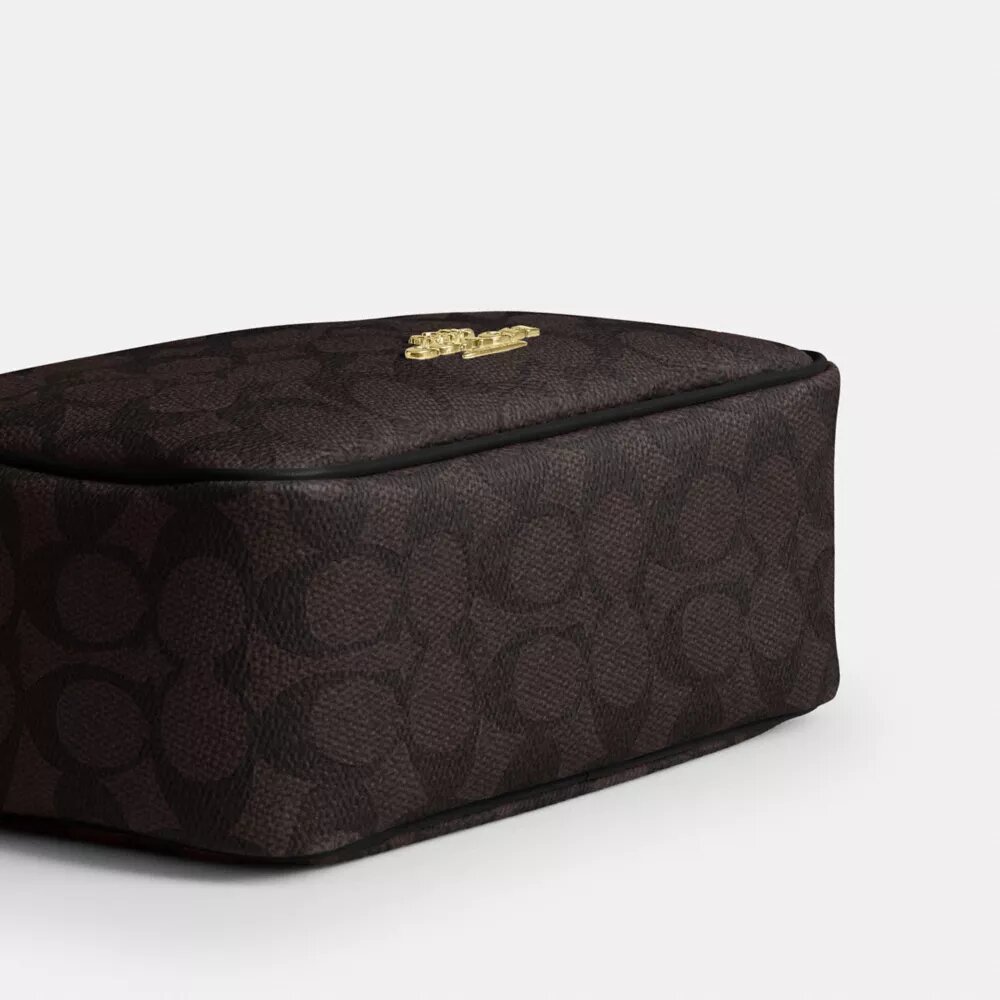 Mini Carey-crossbody-taske i Signature Canvas
