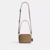 Mini Carey-crossbody-taske i Signature Canvas