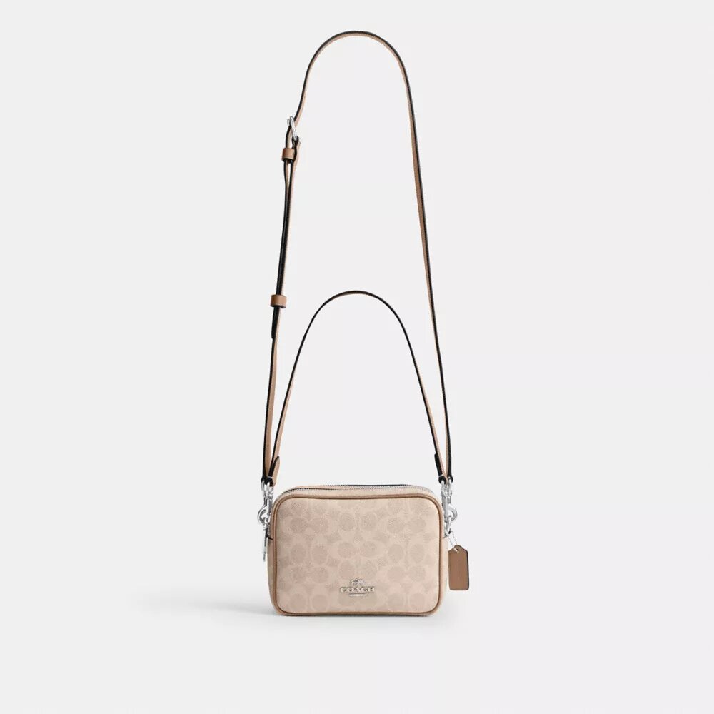 Mini Carey-crossbody-taske i Signature Canvas