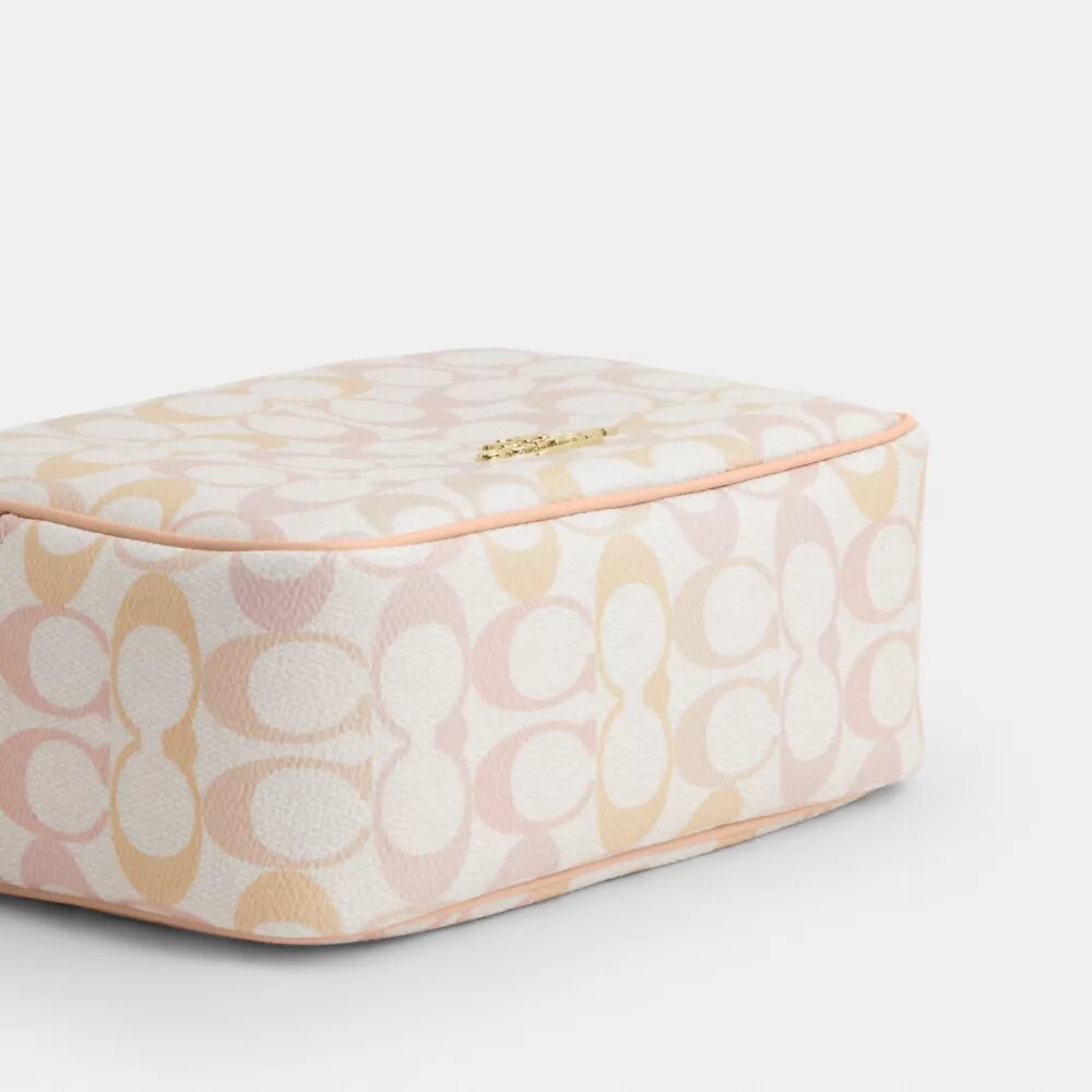 Mini Carey-crossbody-taske i Signature Canvas