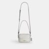 Mini Carey-crossbody-taske i Signature Canvas