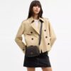 Mini Carey-crossbody-taske i Signature Canvas