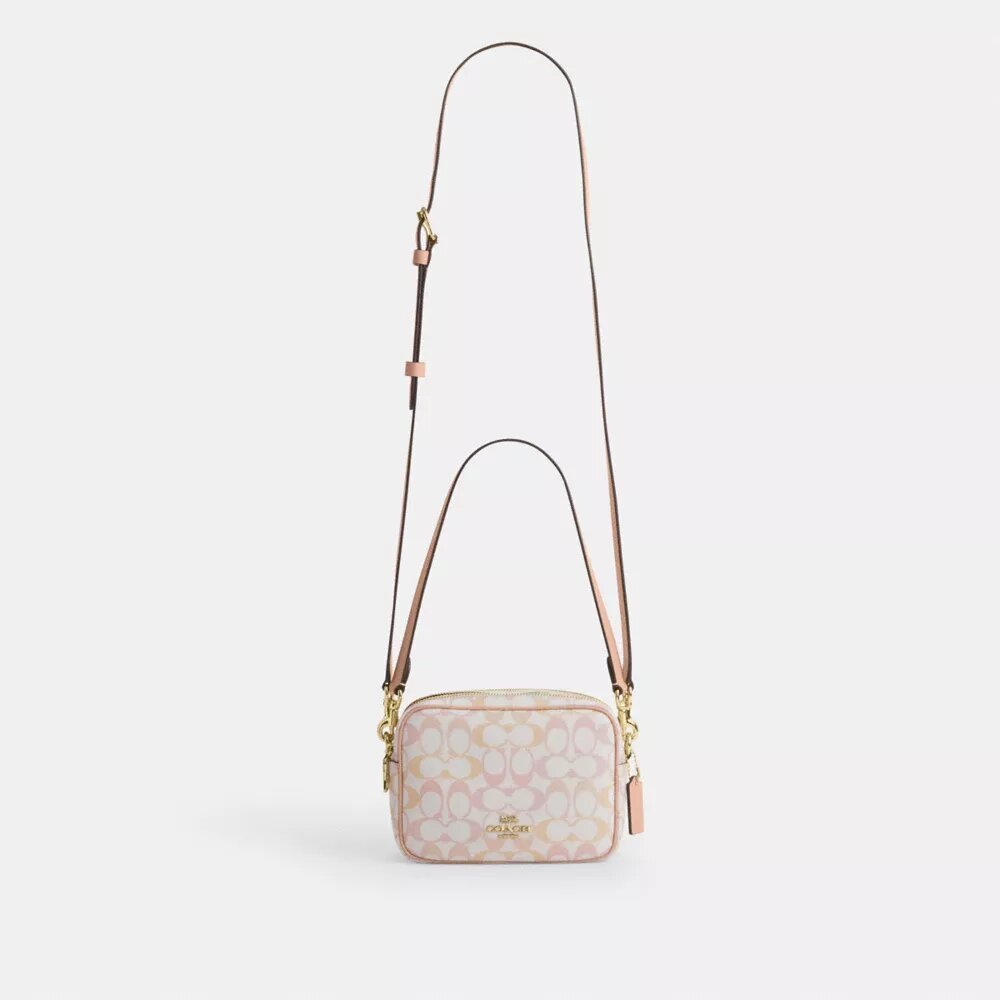 Mini Carey-crossbody-taske i Signature Canvas