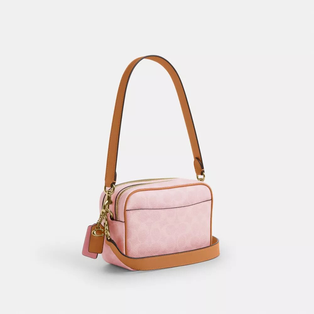 Mini Carey-crossbody-taske i Signature Canvas med Vedhæng