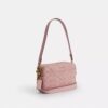 Mini Carey-crossbody-taske i Signature Denim