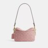 Mini Carey-crossbody-taske i Signature Denim