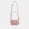 Mini Carey-crossbody-taske i Signature Denim