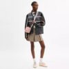 Mini Carey-crossbody-taske i Signature Denim