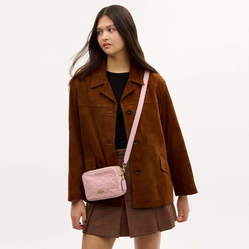 Mini Carey-crossbody-taske i Signature Denim